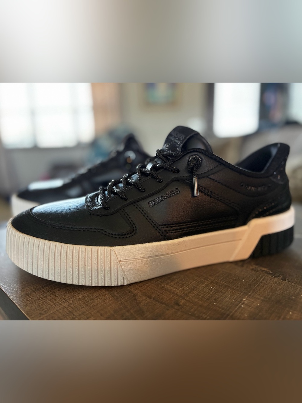 Skechers Women's Black Platform Sneaker with White Sole